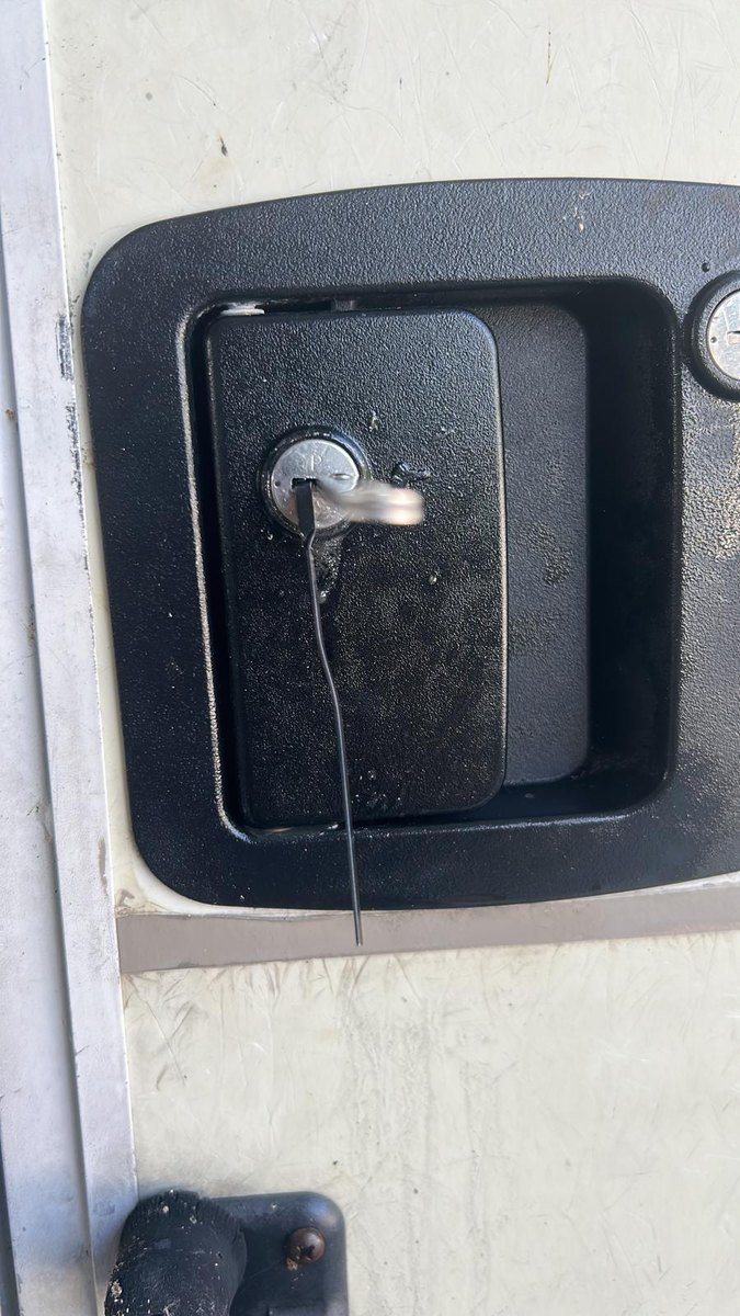 A work truck door opened without damage